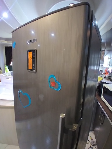 نشت یابی و شارژ گاز و رفع مشکل عدم سرمایش یخچال فریزر اسنوا مدل FEN510CB در رشت 09112305332