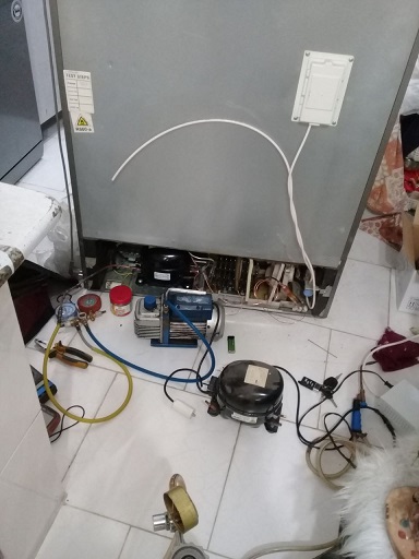 تعویض موتور یا کمپرسور یخچال فریزر نیکسان مدل RF840N-E2 در رشت 09112305332