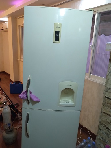 نشت یابی، شارژ گاز و رفع مشکل عدم سرمایش یخچال فریزر سینجر مدل TC-700W در رشت 09112305332 | تعمیر یخچال فریزر سینجر در رشت در منزل
